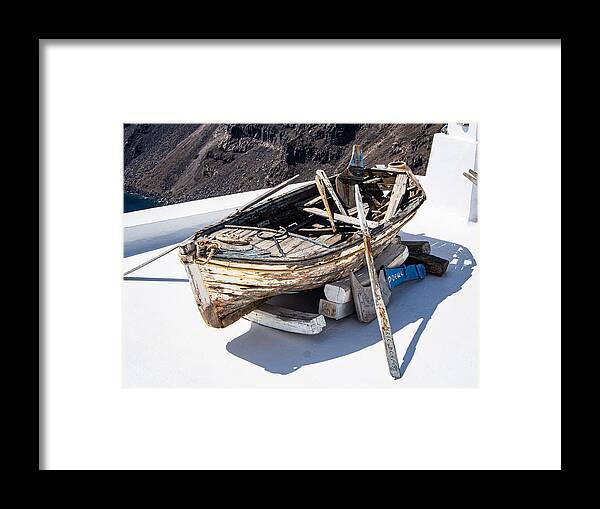 Boat Framed Print featuring the photograph A Weathered Rowboat in Santorini by L Bosco