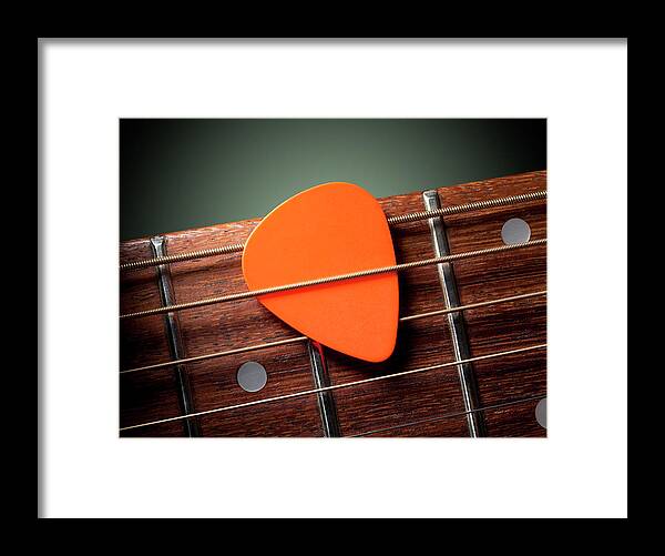 Chord Framed Print featuring the photograph Acoustic Guitar With Pick by Malerapaso