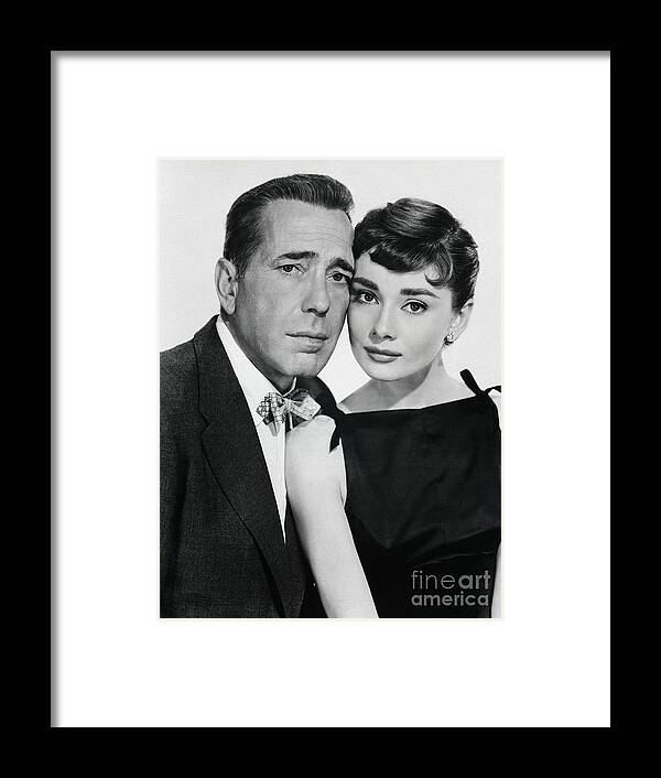 Belgium Framed Print featuring the photograph Actors Humphrey Bogart And Audrey by Bettmann