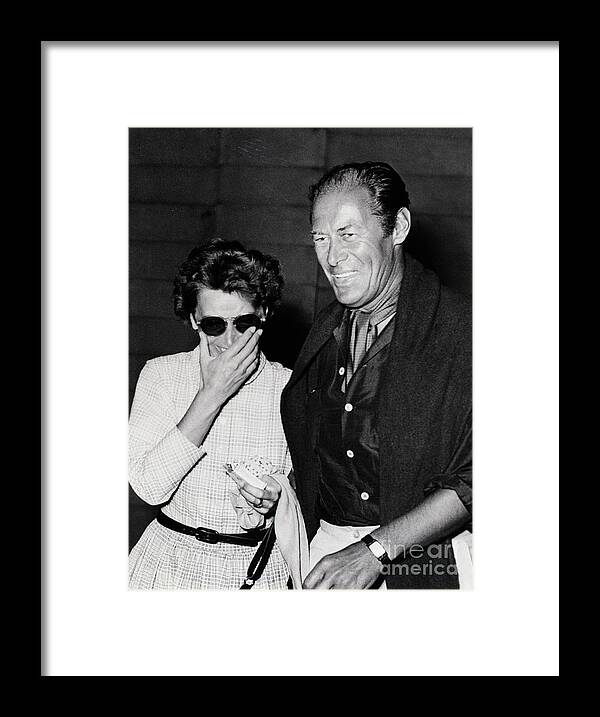 Hiding Framed Print featuring the photograph Actress Greta Garbo With Actor Rex by Bettmann