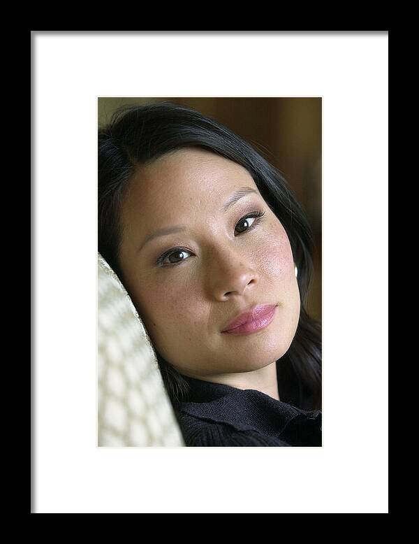 Central Park Framed Print featuring the photograph Actress Lucy Liu At The Ritz Carlton On by New York Daily News Archive