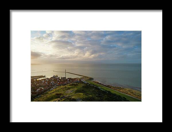 Protection Framed Print featuring the digital art Aerial View Of Wadden Sea Nature Reserve And A Dyke Protecting A Town In Friesland, The Netherlands. by Mischa Keijser