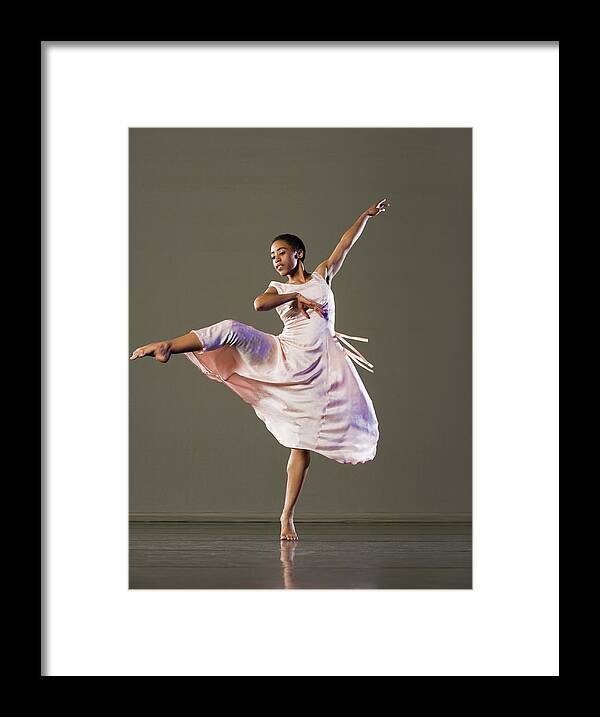 Ballet Dancer Framed Print featuring the photograph African Female Ballet Dancer Dancing by Erik Isakson