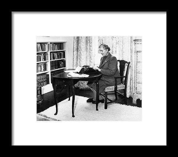 People Framed Print featuring the photograph Agatha Christie Typing At Home by Bettmann