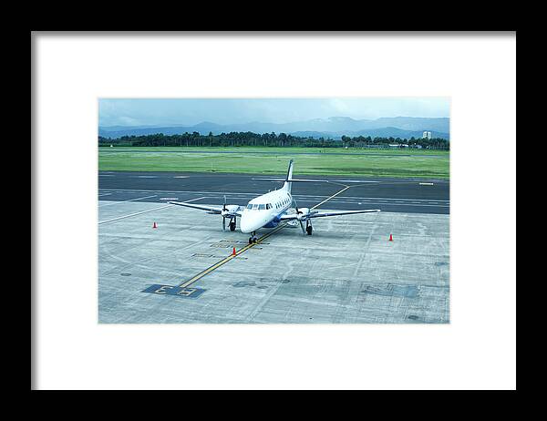 Taking Off Framed Print featuring the photograph Airplane Bad Weather Take Off by Chrissadowski