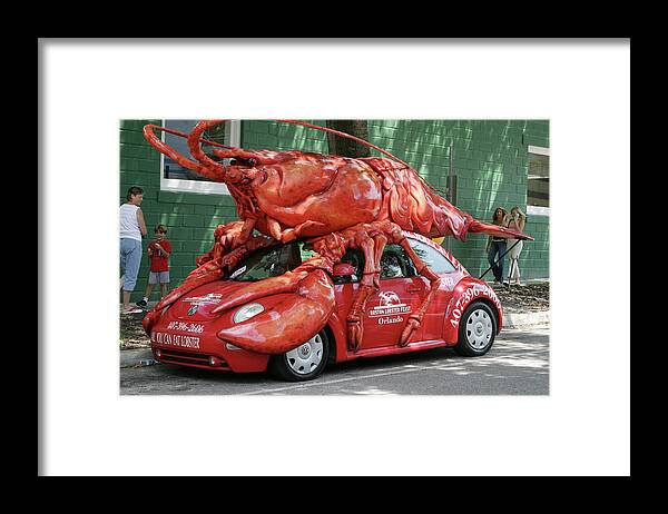 Red Framed Print featuring the photograph A Lobster ate my Car by Carl Purcell