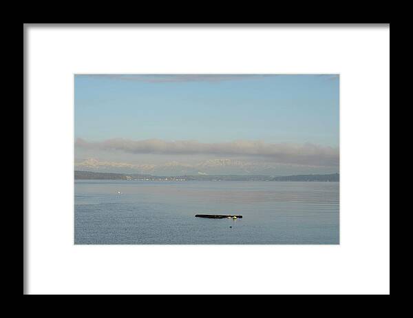 Empty Framed Print featuring the photograph An Empty Dock Floating In The Puget by Aaron Mccoy