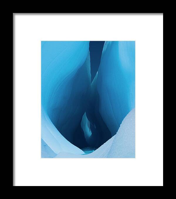 Melting Framed Print featuring the photograph An Iceberg With A Deep Crevasse Or by Mint Images - Art Wolfe