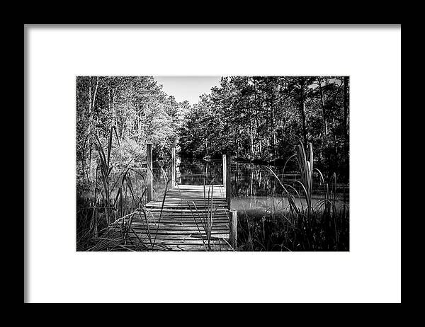 Dock Framed Print featuring the photograph An Old Dock by Bob Decker