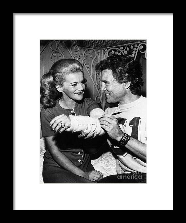 People Framed Print featuring the photograph Ann Margret Has Cast Signed By Husband by Bettmann