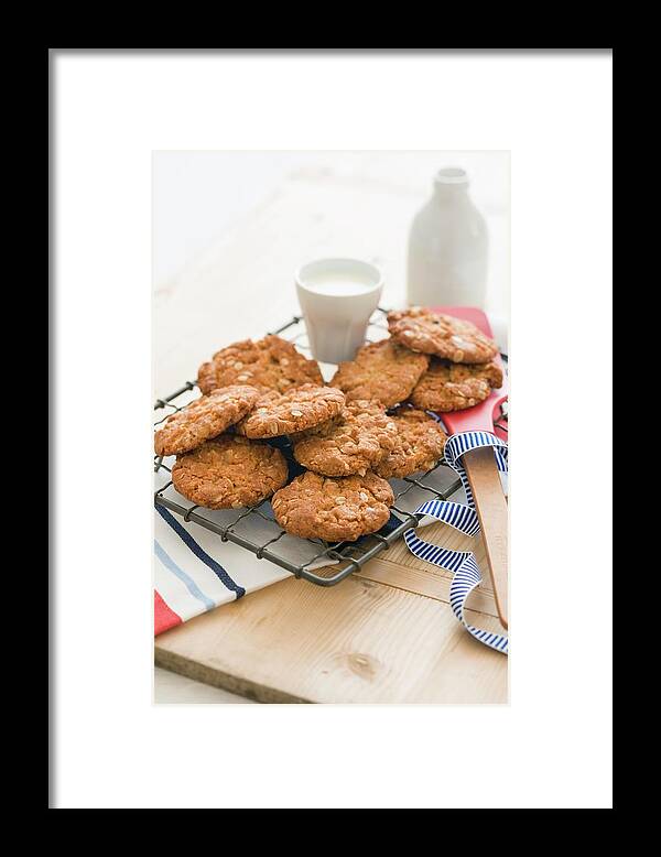 Ip_11361924 Framed Print featuring the photograph Anzac Biscuits On A Wire Rack by Andrew Young