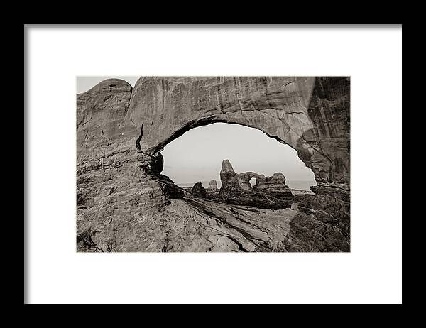 America Framed Print featuring the photograph Arches North Window and Turret Arch - Moab Utah Sepia by Gregory Ballos