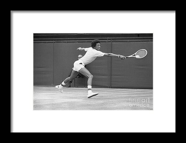 Tennis Framed Print featuring the photograph Arthur Ashe Hitting Backhand Shot by Bettmann