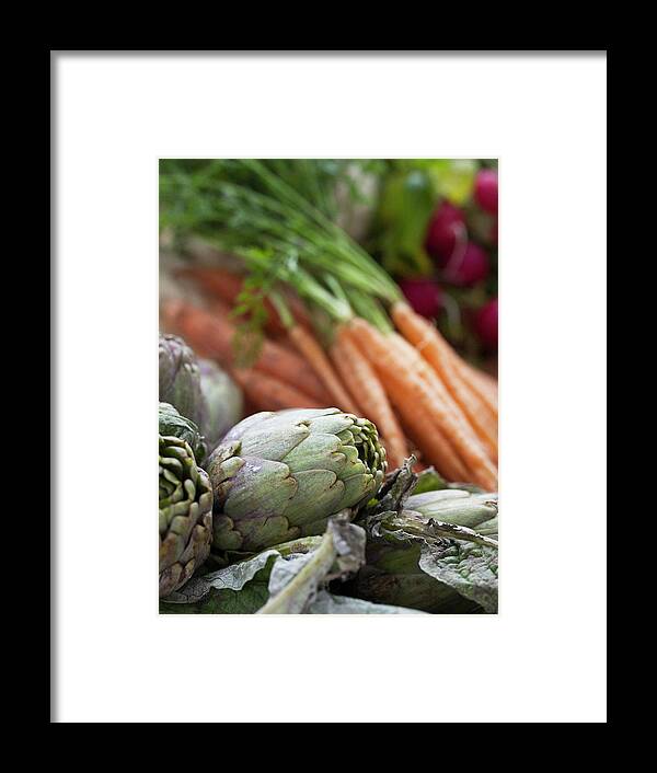 Sweden Framed Print featuring the photograph Artichokes And Carrots by Johner Images