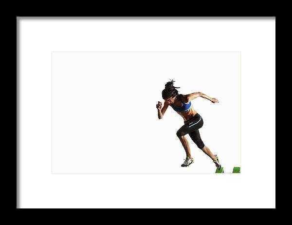 People Framed Print featuring the photograph Athlete Taking Off From Starting Block by Moof
