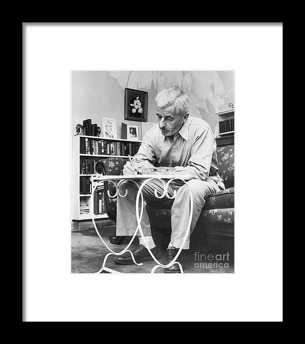 Mature Adult Framed Print featuring the photograph Author William Faulkner Writing by Bettmann