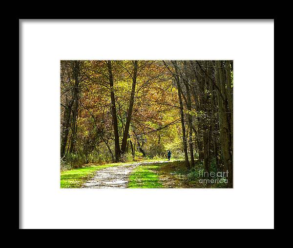 Autumn Framed Print featuring the photograph Autumn Jogger by Donald C Morgan