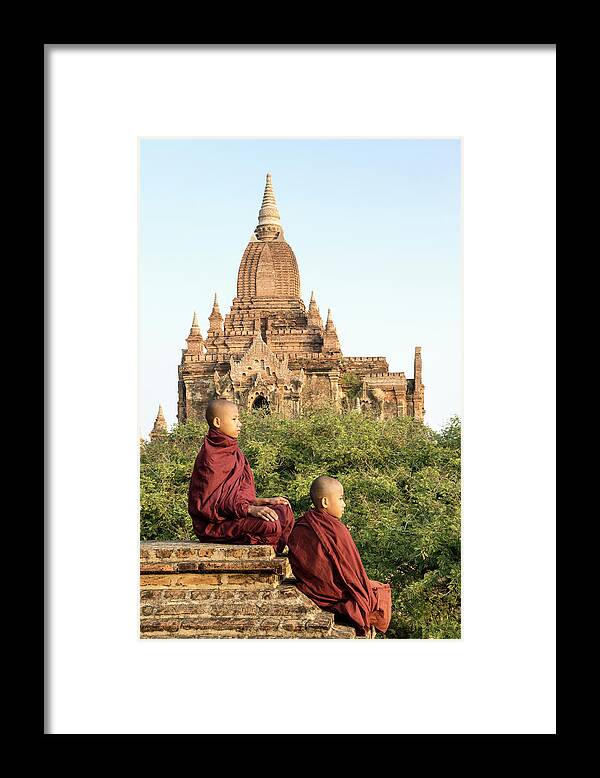 Steps Framed Print featuring the photograph Bagan, Buddhist Monks Sitting On Temple by Martin Puddy