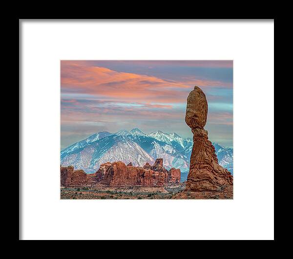 Arches Framed Print featuring the photograph Balance And La Sal Mountains by Tim Fitzharris