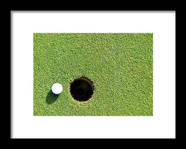 Ball Framed Print featuring the photograph Ball And Hole by Pkg Photography