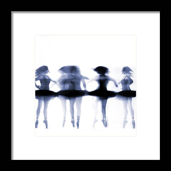 Ballet Dancer Framed Print featuring the photograph Ballet Dancer Pirouetting On White by Phil Payne Photography
