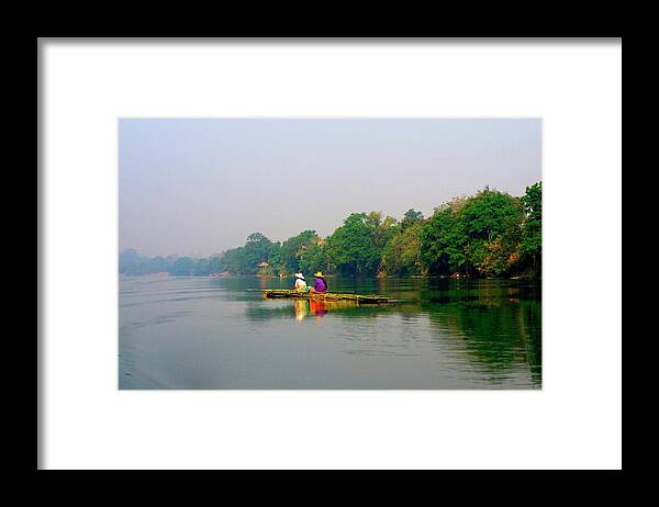 People Framed Print featuring the photograph Bamboo Raft by Jim Simmen