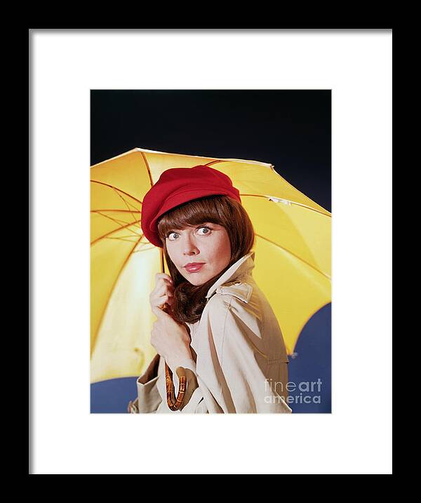 Mid Adult Women Framed Print featuring the photograph Barbara Feldon Posing With Umbrella by Bettmann