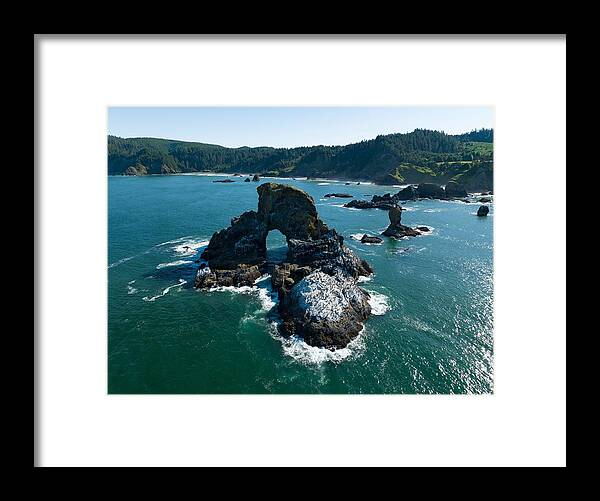 Landscapeaerial Framed Print featuring the photograph Basalt Sea Stacks Lie by Ethan Daniels