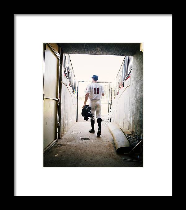 One Man Only Framed Print featuring the photograph Baseball Player Walking Through Stadium by Jim Bastardo