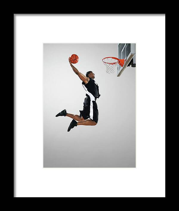 People Framed Print featuring the photograph Basketball Player Dunking Ball, Low by Blake Little