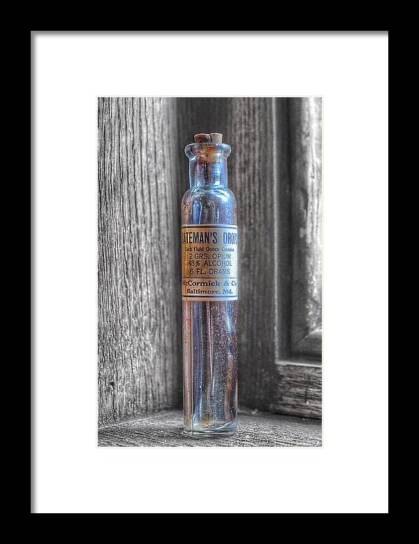 Bateman's Drops Framed Print featuring the photograph Antique McCormick and Co Baltimore MD Bateman's Drops Opium Bottle by Marianna Mills