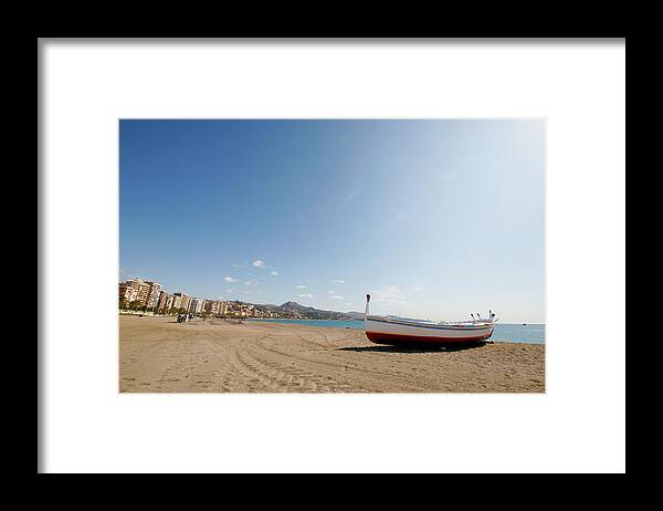 Rowboat Framed Print featuring the photograph Beach And Boat In Malaga by Cirilopoeta
