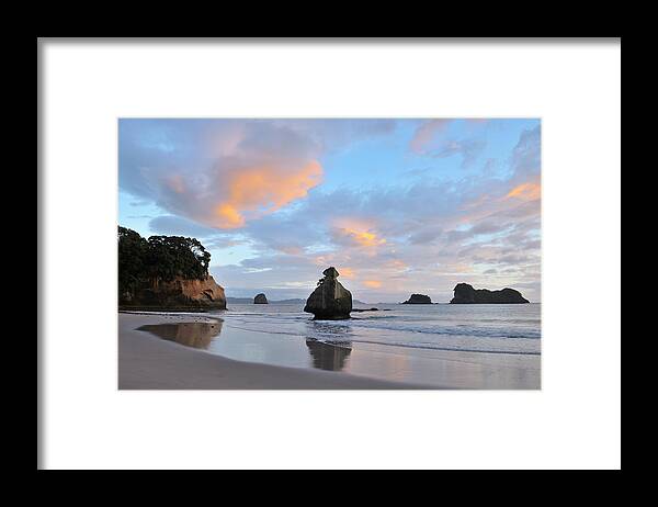Water's Edge Framed Print featuring the photograph Beach At Dawn by Raimund Linke