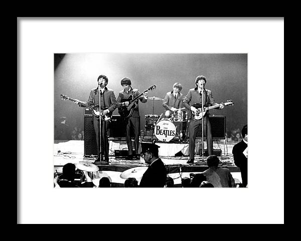Rock Music Framed Print featuring the photograph Beatles Perform In Washington, D.c by Michael Ochs Archives