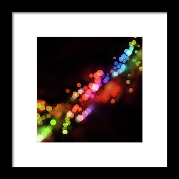 Funky Framed Print featuring the photograph Black Background With Dots Of Varying by Skystardream