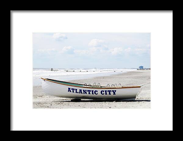 Water's Edge Framed Print featuring the photograph Boat On Atlantic City Beach by Ogphoto