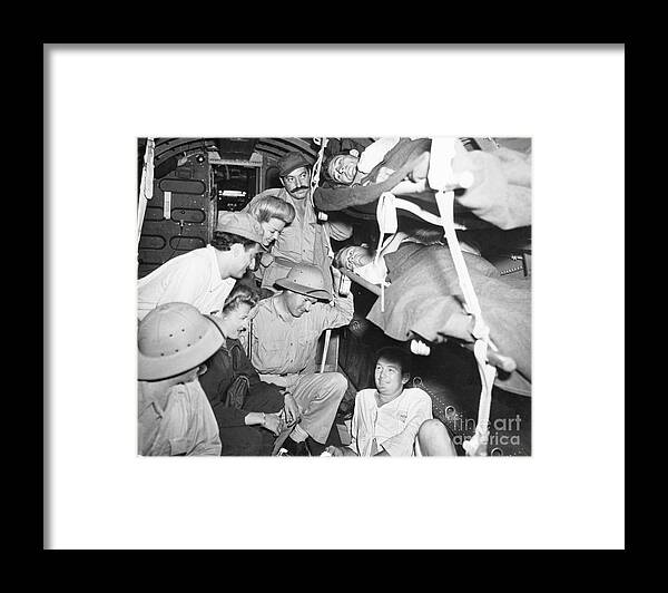 People Framed Print featuring the photograph Bob Hope Chatting With Wounded by Bettmann