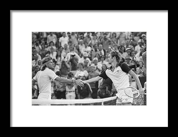 1980-1989 Framed Print featuring the photograph Borg Congratulating Mcenroe On Win by Bettmann