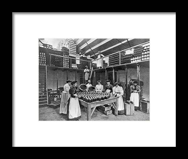 Large Group Of Objects Framed Print featuring the photograph Bottling Room by Hulton Archive