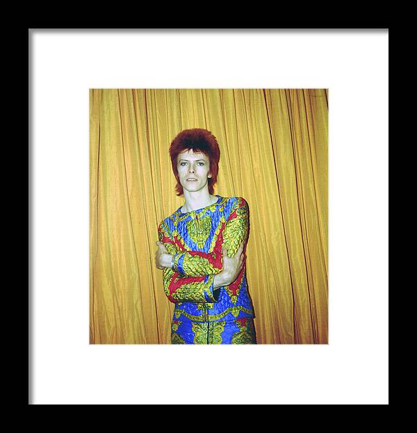 Ziggy Stardust - Persona Framed Print featuring the photograph Bowie As Ziggy Stardust In Ny by Michael Ochs Archives