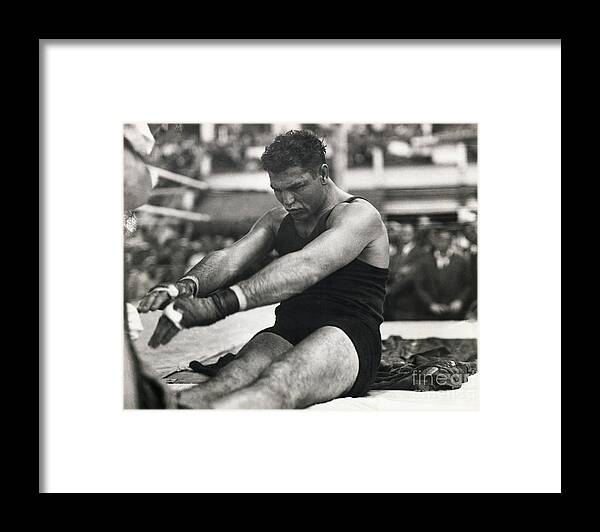 People Framed Print featuring the photograph Boxer Jack Dempsey Stretching by Bettmann