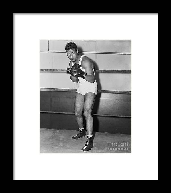 Boxing Champion Joe Louis Framed Print by Bettmann 