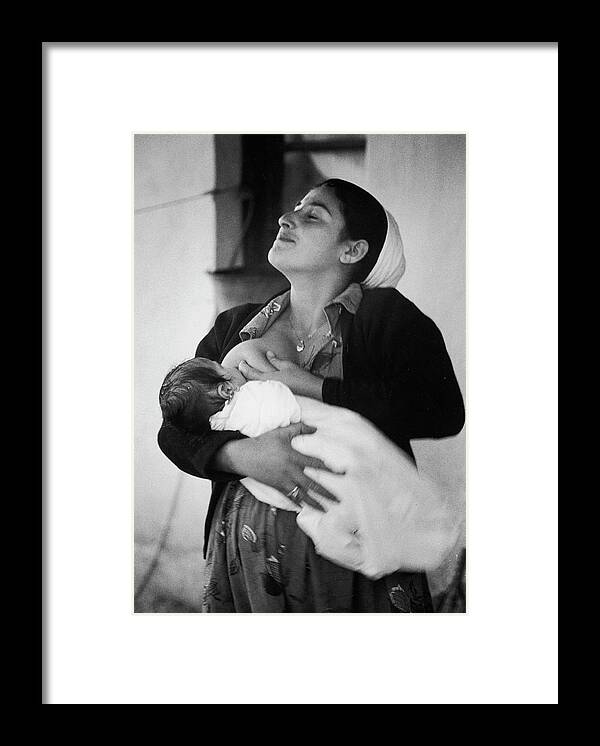 Israel Framed Print featuring the photograph Breastfeeding by Paul Schutzer