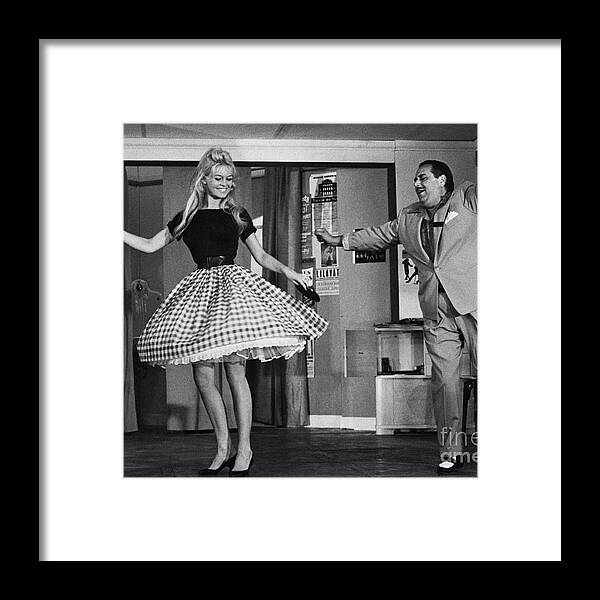 People Framed Print featuring the photograph Brigitte Bardot Dancing In Wide Skirt by Bettmann