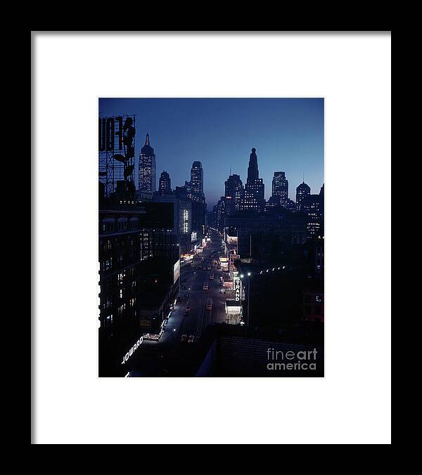 Scenics Framed Print featuring the photograph Broadway In New York At Night by Bettmann