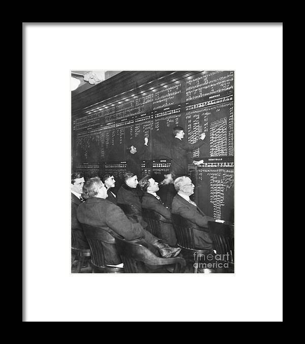 Corporate Business Framed Print featuring the photograph Brokers Examining Boards Of The Curb by Bettmann