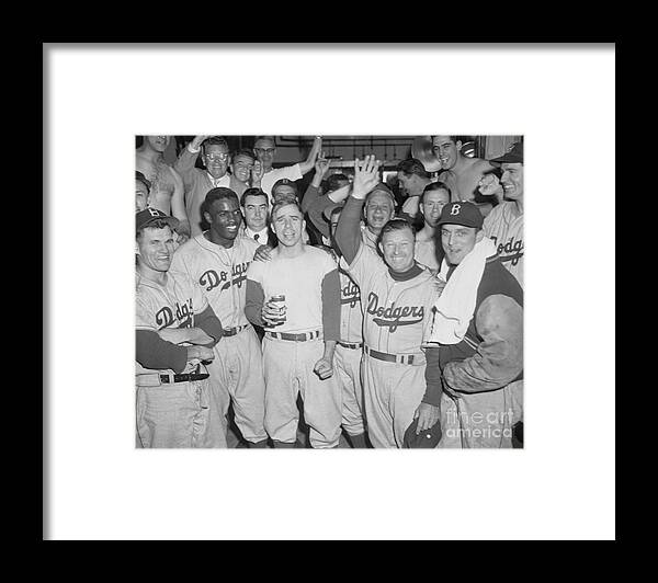 Mature Adult Framed Print featuring the photograph Brooklyn Dodgers Waving In Celebration by Bettmann
