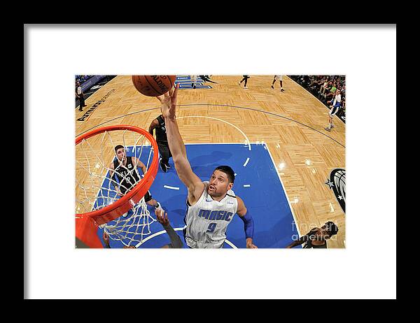 Nikola Vucevic Framed Print featuring the photograph Brooklyn Nets V Orlando Magic by Fernando Medina