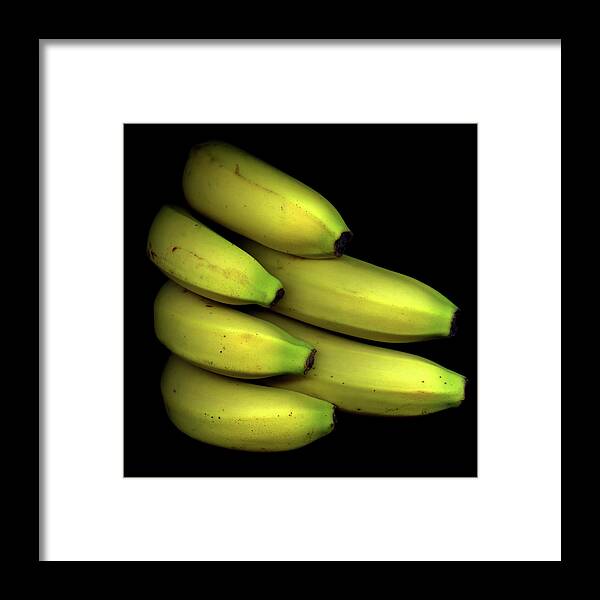 Black Background Framed Print featuring the photograph Bunch Of Bananas by Photograph By Magda Indigo