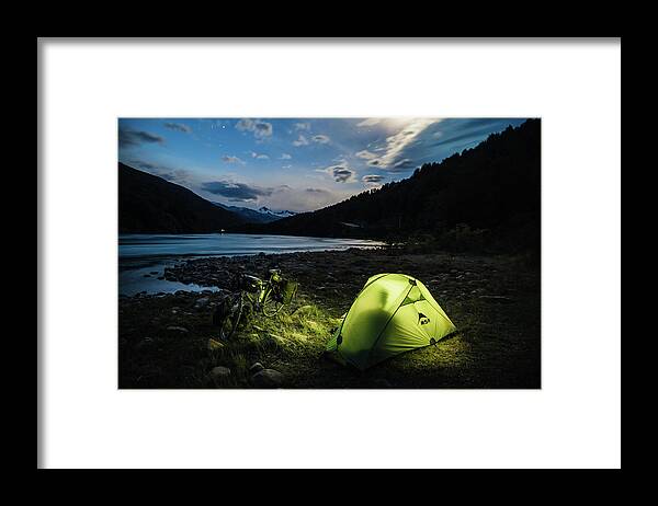 Bicycle Tour Framed Print featuring the photograph Camping along a river in Chilean Patagonia by Kamran Ali